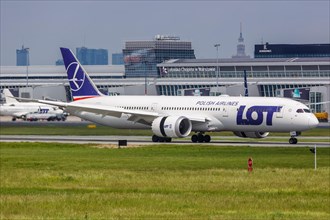 A Boeing 787-9 Dreamliner aircraft of LOT Polskie Linie Lotnicze with registration SP-LSD at Warsaw Airport