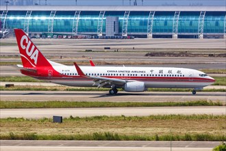 A China United Airlines CUA Boeing 737-800 aircraft with registration number B-1279 at Guangzhou Airport