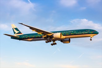 A Cathay Pacific Boeing 777-300ER aircraft with registration B-KPB and special livery The Spirit of Hong Kong at London Heathrow Airport