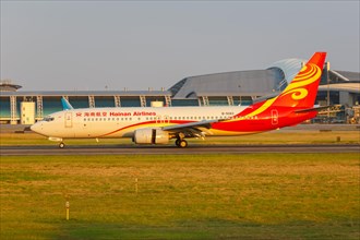 A Hainan Airlines Boeing 737-800 aircraft with registration number B-5083 at Guangzhou Airport