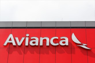 Avianca logo on a building at Bogota Airport