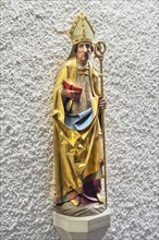 Figure of a saint with crosier and book