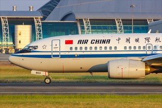 An Air China Boeing 737-700 aircraft with registration number B-5803 at Guangzhou Airport