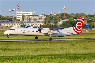 A Bombardier DHC-8-400 of LOT Polskie Linie Lotnicze with registration SP-EQG at Warsaw Airport