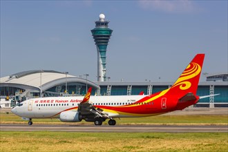 A Hainan Airlines Boeing 737-800 aircraft with registration number B-7886 at Guangzhou Airport