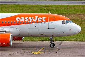 An EasyJet Airbus A320 with the registration G-EZWD at London Airport