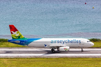 An Air Seychelles Airbus A320 aircraft with registration number S7-AMI at Mahe Airport