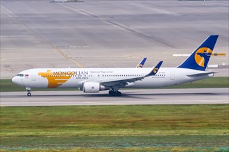 A Mongolian Airlines Boeing 767-300ER with registration number JU-1021 at Seoul Incheon International Airport