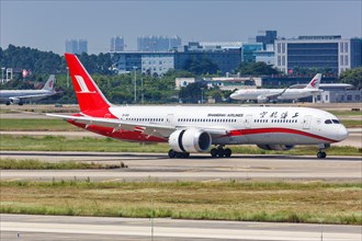 Boeing 787-9 Dreamliner aircraft of Shanghai Airlines with registration number B-1113 at Guangzhou airport