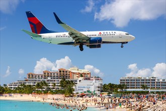 A Boeing 737-700 of Delta Air Lines with the registration N309DE at the airport St. Maarten