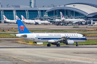An Airbus A320 aircraft of China Southern Airlines with registration number B-2406 at Guangzhou Baiyun Airport