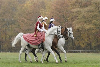 Female riders in historical costume