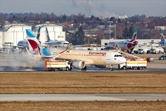 An Airbus A320 of Eurowings with the registration D-AEWR during de-icing at Stuttgart Airport