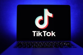 TikTok app logo on the screen of a laptop