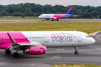 A Wizzair Airbus A321 with the registration number HA-LXU at London Airport