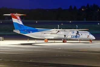 A Bombardier DHC-8-400 of Luxair with the registration LX-LQB at Luxembourg Airport