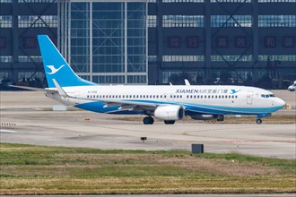 A Boeing 737-800 aircraft of Xiamenair with registration number B-1709 at Shanghai airport