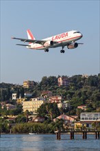 A Lauda Airbus A320 aircraft with registration number OE-LOB at Corfu Airport