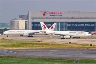 Airbus and Boeing aircraft of China Eastern Airlines at Shanghai Airport