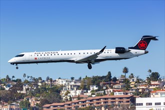 A Bombardier CRJ-700 aircraft of Air Canada Express with registration C-FBJZ lands at San Diego Airport