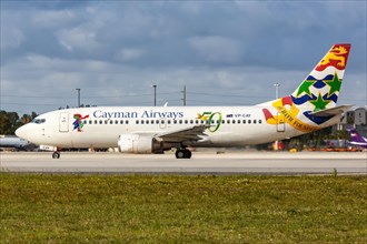 A Boeing 737-300 aircraft of Cayman Airways with the registration VP-CAY at Miami Airport