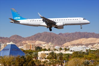 An Arkia Embraer 190 with registration number 4X-EMB lands at Eilat Airport