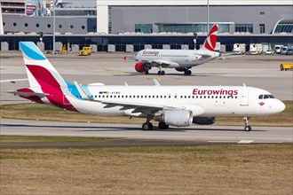 An Airbus A320 of Eurowings with the registration D-AEWQ at Stuttgart Airport