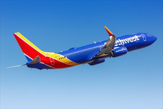 A Southwest Airlines Boeing 737-800 aircraft with registration number N8679A takes off from Phoenix Airport