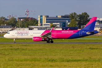 An Airbus A321 aircraft of Wizzair with registration number HA-LTA at Warsaw Airport
