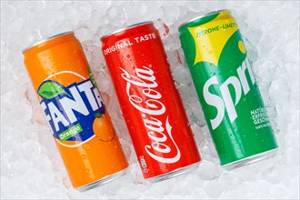 Coca Cola Coca-Cola products Fanta Sprite lemonade soft drink drinks in can ice cube ice cubes against a white background in Germany