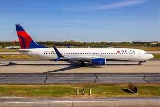 A Delta Air Lines Boeing 737-900ER aircraft with registration number N912DU takes off from Atlanta Airport