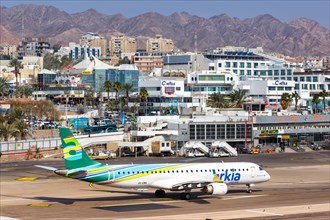 An Arkia Embraer 195 with registration 4X-EMA takes off from Eilat Airport