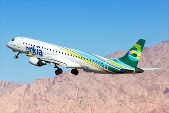 An Arkia Embraer 195 with registration 4X-EMA takes off from Eilat Airport