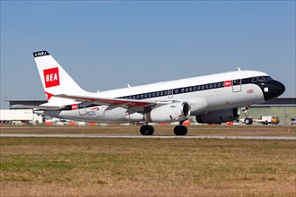 An Airbus A319 aircraft of British Airways with the registration G-EUPJ in the retro special livery takes off from Stuttgart Airport