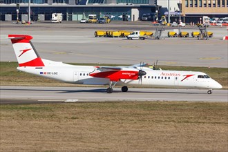 A Bombardier DHC-8-400 of Austrian Airlines with the registration OE-LGC at Stuttgart Airport