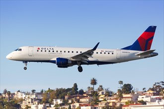 A Delta Connection Embraer ERJ 175 aircraft with registration number N636CZ lands at San Diego Airport