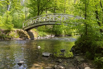 White arch bridge over the river Grosse Roeder