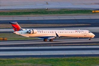 A Bombardier CRJ-900 aircraft of Delta Connection Endeavor Air with registration N304PQ at Atlanta Airport
