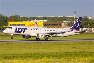 An Embraer 195 of LOT Polskie Linie Lotnicze with the registration SP-LNE at Warsaw Airport