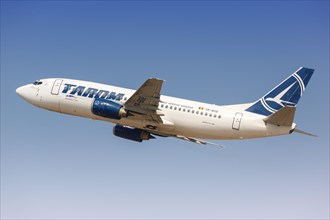A Tarom Boeing 737-300 aircraft with registration number YR-BGE takes off from Tel Aviv Airport