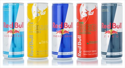 Red Bull Energy Drinks products lemonade soft drink drinks in a row can exempted isolated in Germany