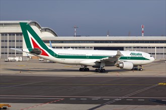 An Alitalia Airbus A330-200 with registration number EI-EJN at Malpensa airport in Milan