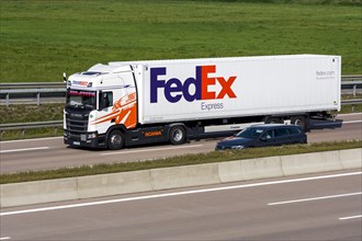 FedEx truck driving on the A8 motorway near Jettingen