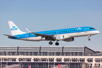 A KLM cityhopper Embraer ERJ190 with registration PH-EXA lands at Stuttgart Airport