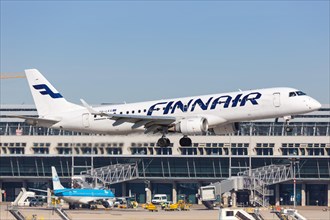 A Finnair Embraer ERJ190 with registration OH-LKG lands at Stuttgart Airport