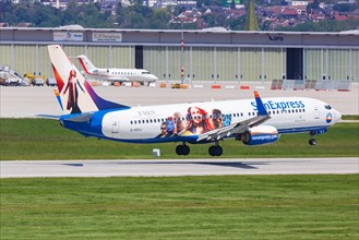 A SunExpress Germany Boeing 737-800 with the registration D-ASXJ and the special livery X-Men Dark Phoenix lands at Stuttgart Airport