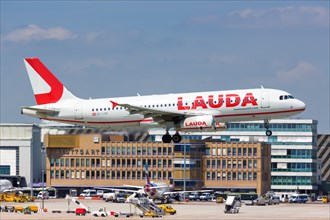A Lauda Airbus A320 aircraft with registration OE-LOB lands at Stuttgart Airport