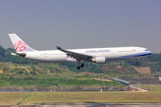 An Airbus A330-300 aircraft of China Airlines with registration number B-18303 at Chengdu airport