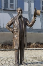 Bronze sculpture of Levi Strauss in front of his birthplace