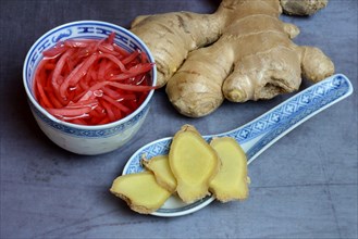 Pickled ginger in small bowls and ginger slices
